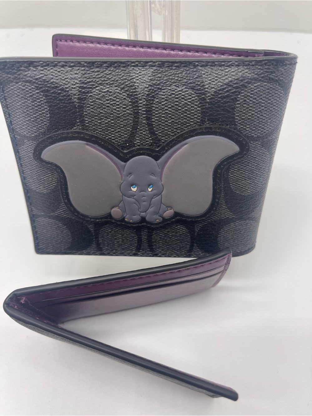Coach 3 in 1 Signature Disney X Wallet Dumbo 91654 Charcoal Plum Multi
NWT - Picture 15 of 16